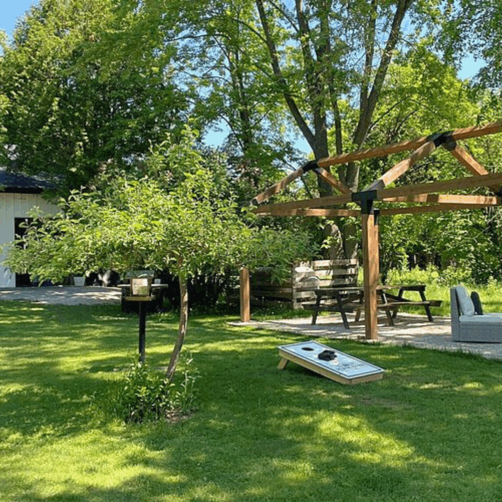 Yard and porch at Peach Barn Farmhouse in Door County, WI.