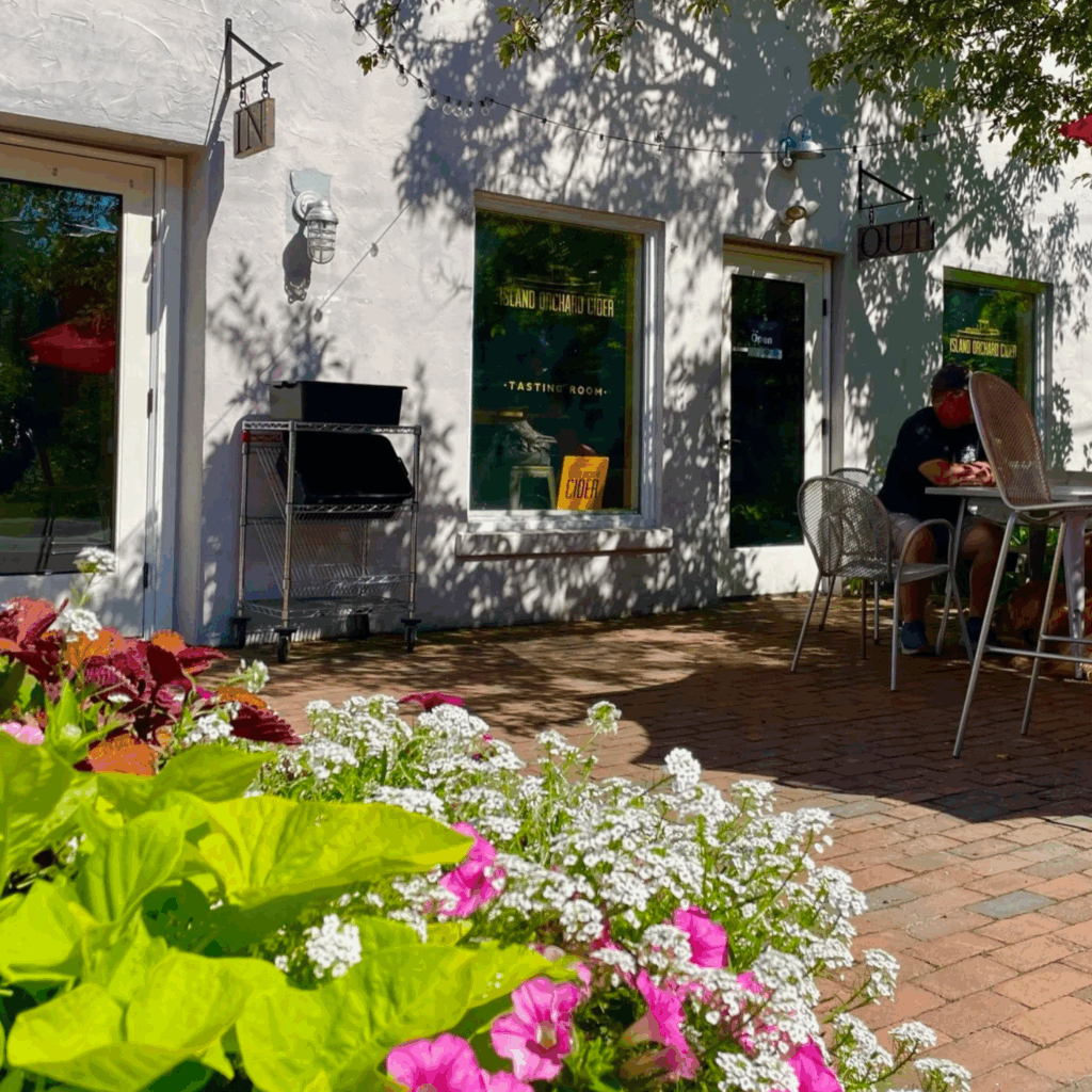 Outdoor patio at Island Orchard Cider Company in Door County. Must visit cidery.